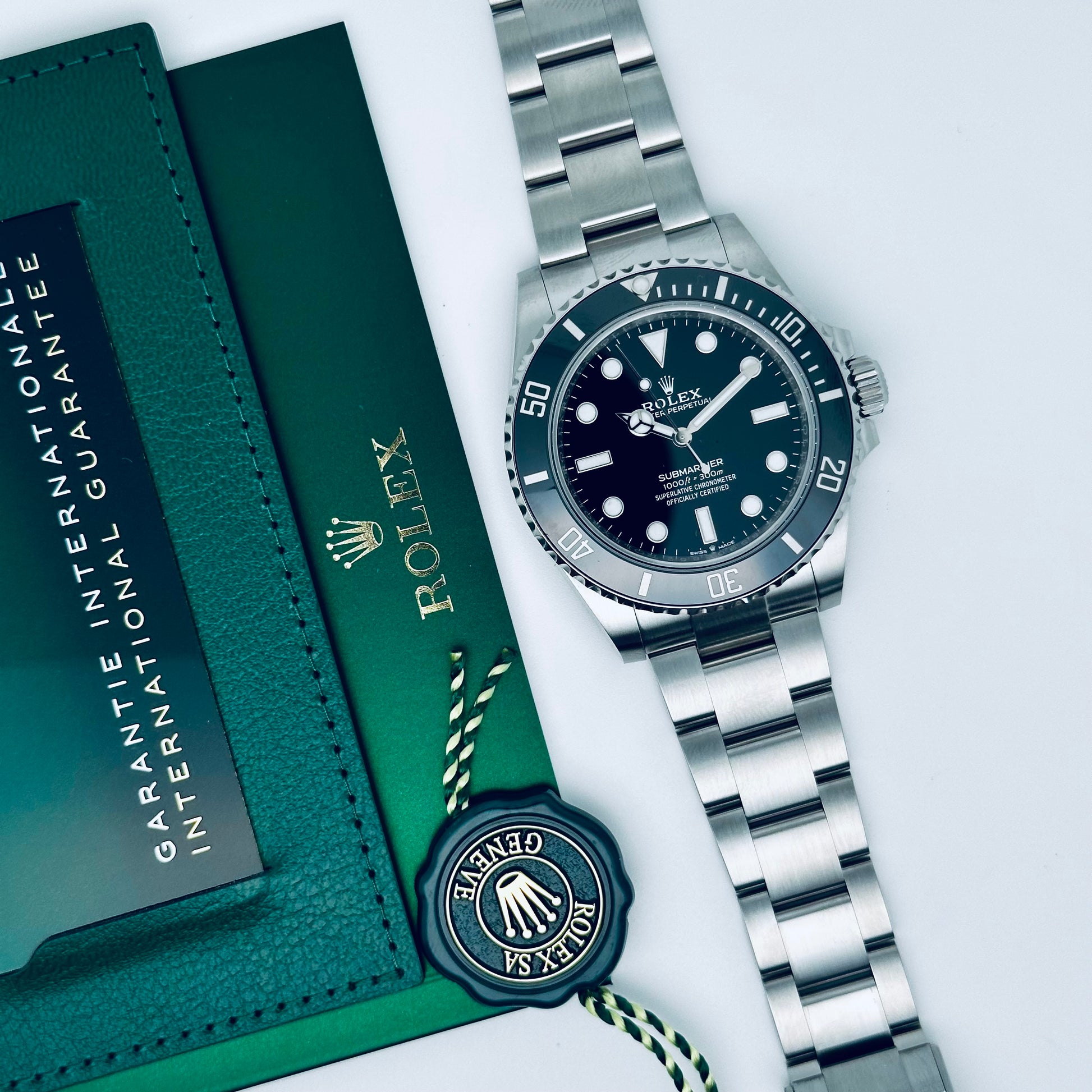 Rolex Submariner / 124060 / schwarz / Oyster / Full Set